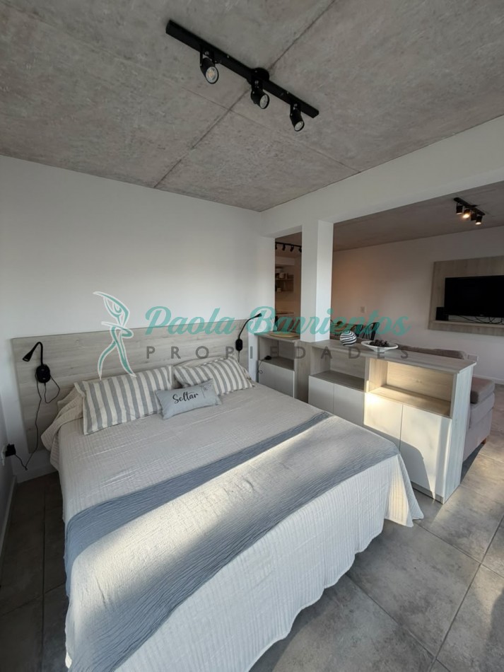 Vendo departamento con dos cocheras 